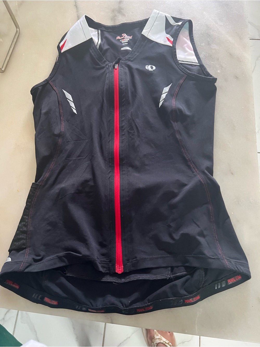 Pearl Izumi Women's Black Cycling Jersey with Red Zipper. Medium size